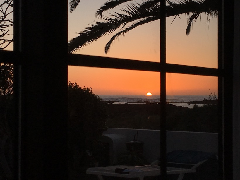 mentors for online business. Image of a beautiful sunset viewed from a beachside apartment. Shows what running an online can offer in terms of freedom